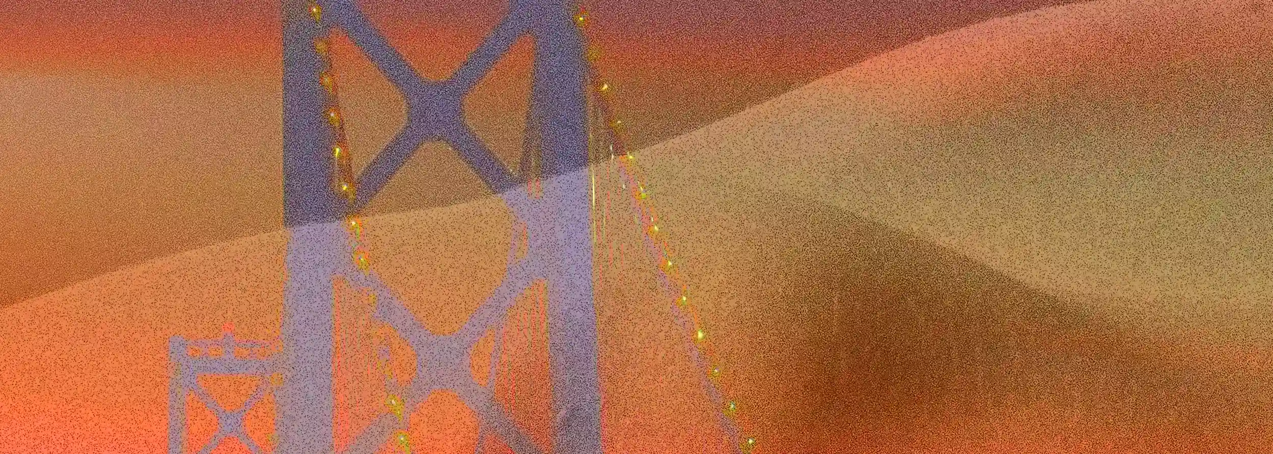 Close-up detail of Vele dorate: the metallic tower of the bridge and the illuminated cables merge with the softness and golden texture of the human body