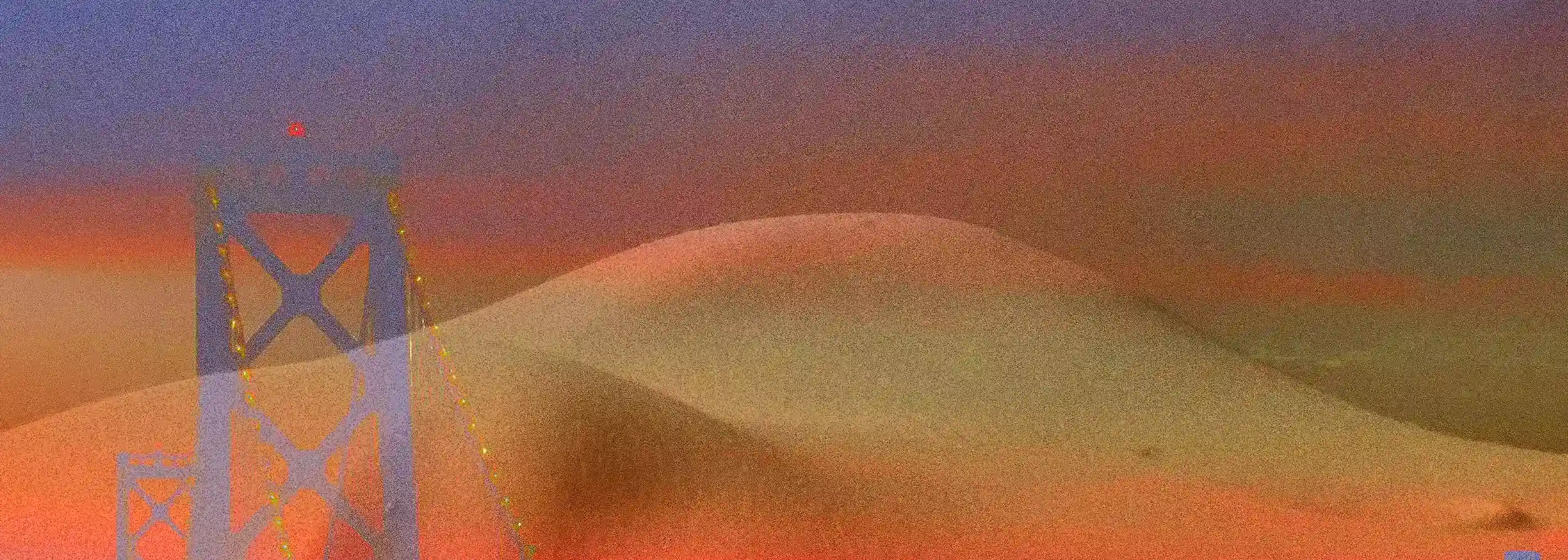 Vision of Vele dorate: the structure of the Bay Bridge overlaps the golden curve of a human abdomen in a surreal Californian sunset landscape