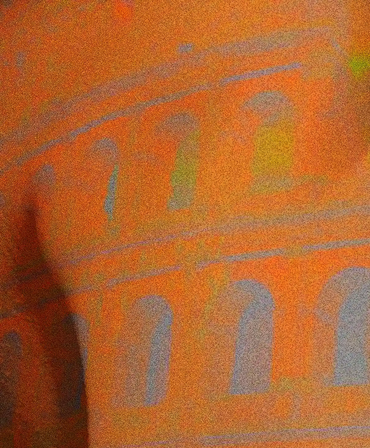Close-up detail of the artwork Vestigia: the texture of the digital painting enhances the visual fusion between the warm shadows of the anatomy and the stone arches of the Colosseum